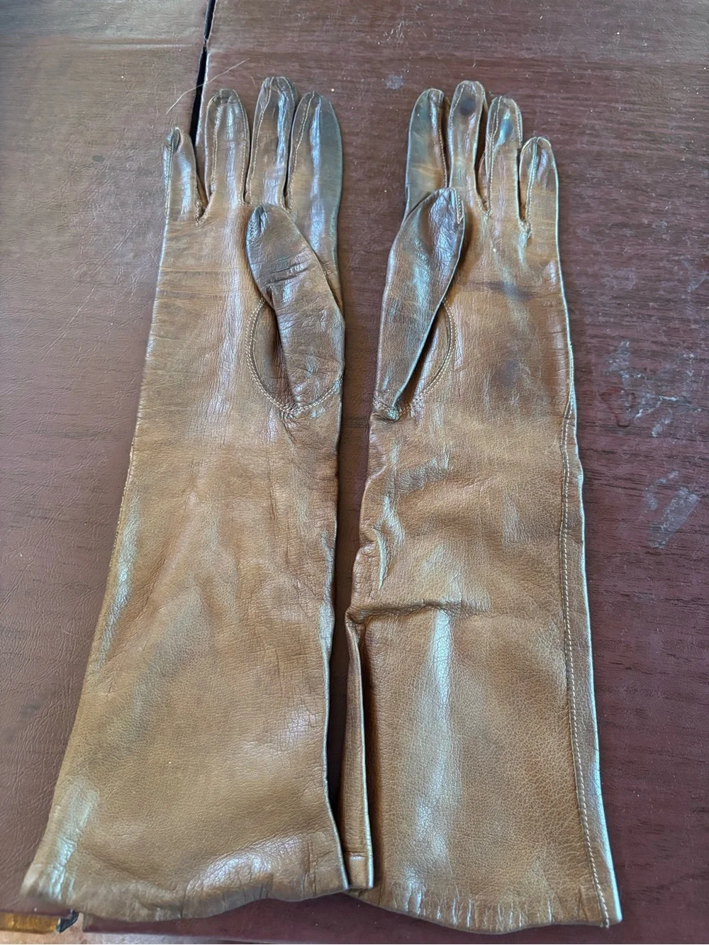 Vintage made in France brown leather gloves size 6.5 unlined silk mid length